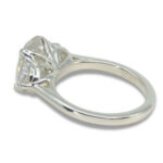 Three Stone Oval Moissanite 4.43ctw. Ring with Half Moon Accents